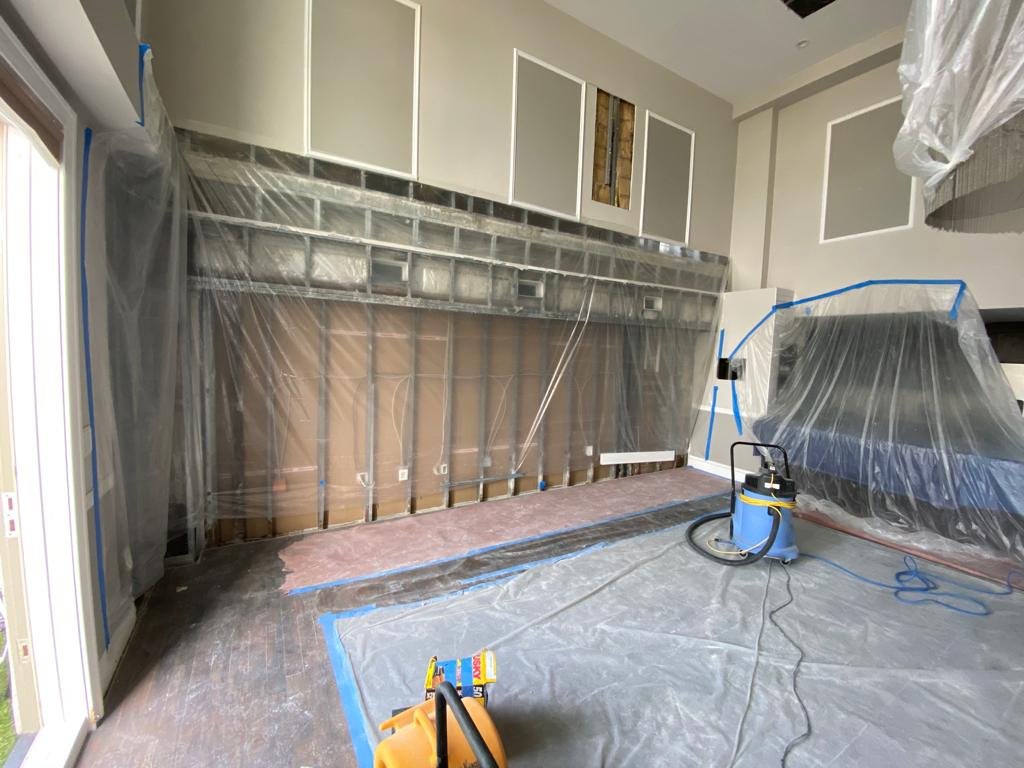 Vapor barrier containment system isolating a Staten Island work area