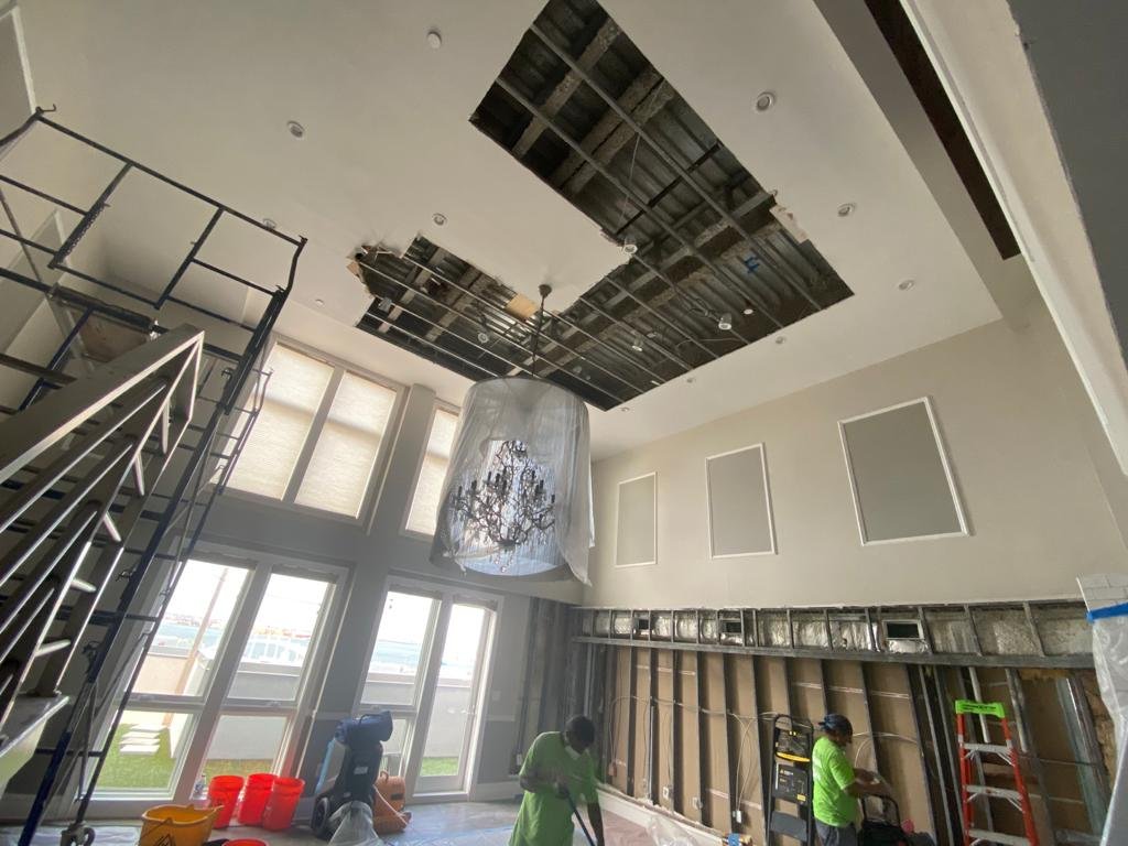 Anajur Construction crew working at multi-elevation scale on a Staten Island restoration project, demonstrating the operational depth of an NYC HIC-licensed contractor working since 1997